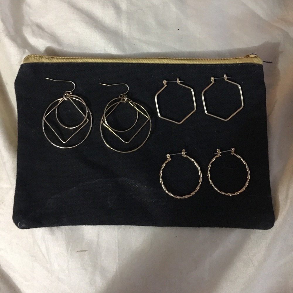 Three pairs of earrings.